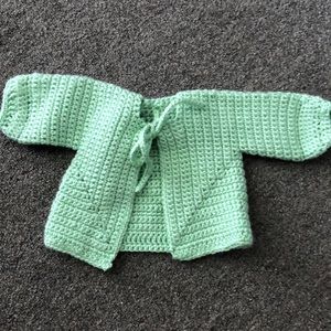 Mint green crochet baby sweater